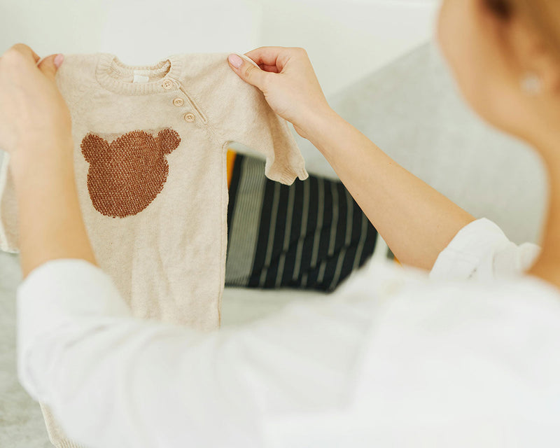 newborn onesie with bear on it for article on baby shower gifts